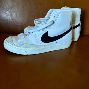 Women’s Nike White and Black High-Top Sneakers